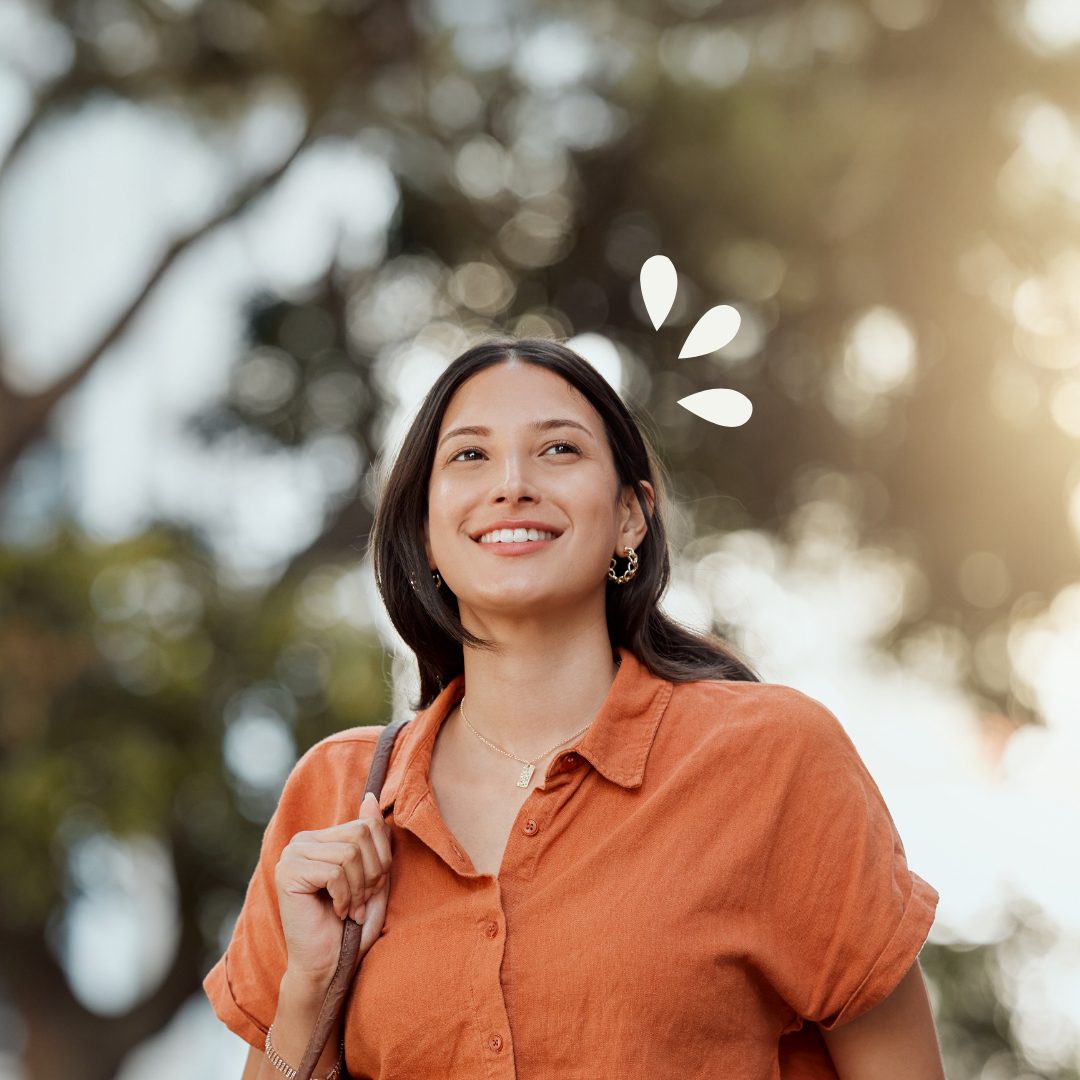 Young woman candidly walking outdoors