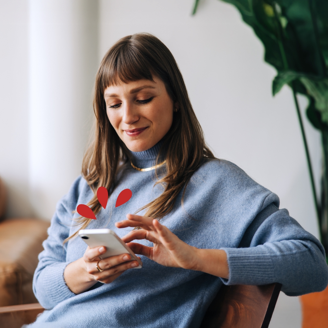 ECU Text Banking Woman using text banking commands with her device