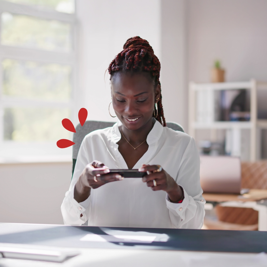 Mobile Deposit Woman making a mobile deposit at home
