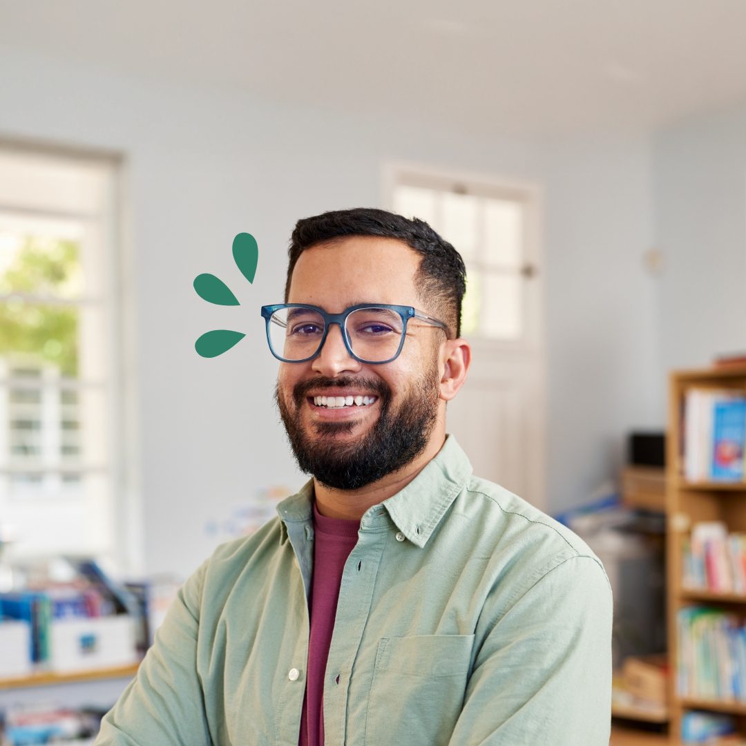 How to Become an ECU Member Smiling man standing inside of his home