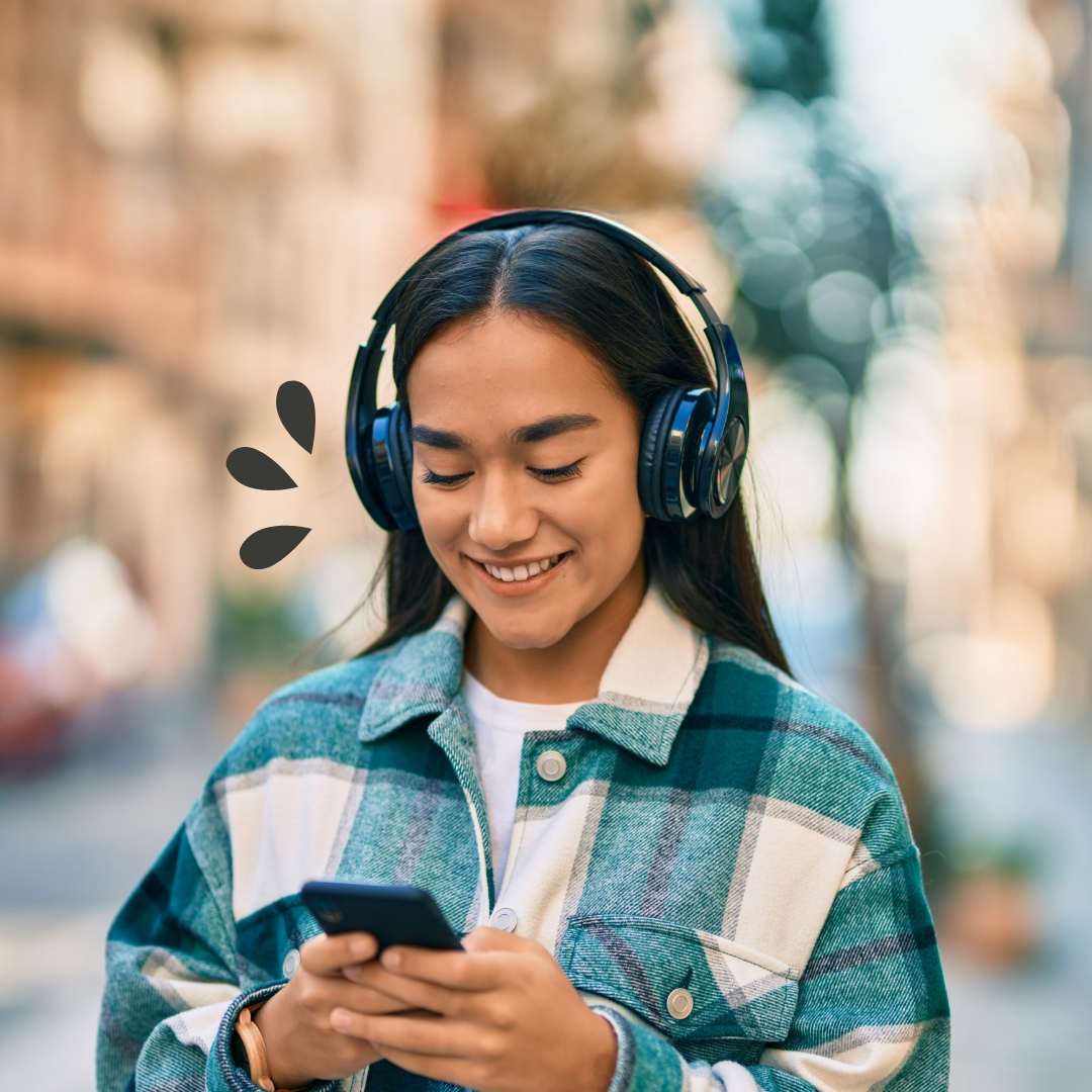 Money Management Tool Young woman with headphones using her device